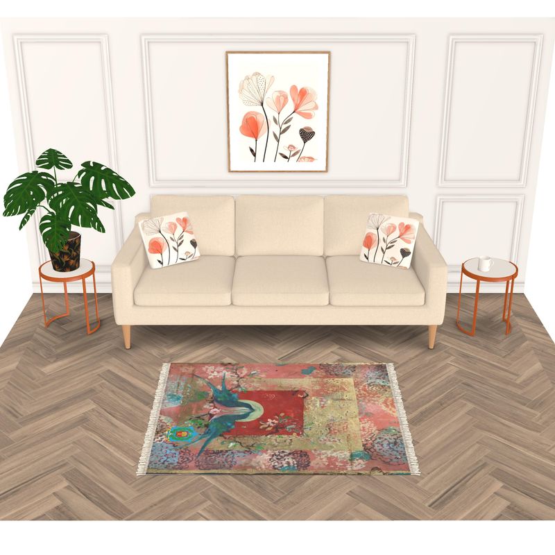 A cozy living room with a beige sofa has floral cushions and a heavyweight velvet designer rug that adds color to the herringbone floor, featuring an anti-slip base. Floral artwork captivates above the couch, while a green potted plant and round side tables complete the decor.