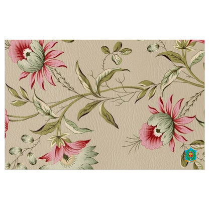 The FeelGood Breakfast placemat features a vintage tapestry look with a beige background and large pink and green floral patterns. Handmade to order, it includes a small colorful shield emblem in the bottom right corner, perfect for enhancing your breakfast experience.