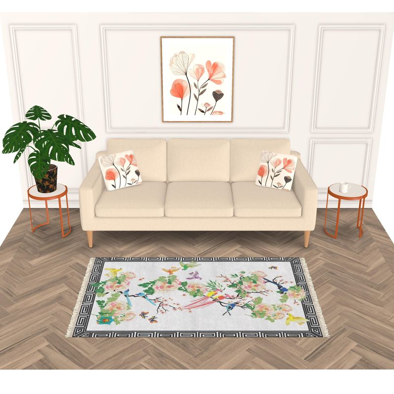 A modern living room features a velvet sofa adorned with floral pillows, a handmade rug with colorful patterns on the herringbone floor, and a floral painting above. A large green plant and two round side tables elegantly flank the sofa.