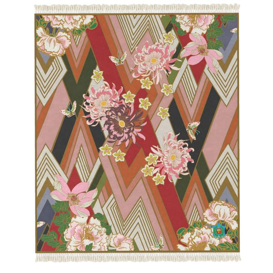 This handmade Rug features a geometric chevron pattern in red, pink, and brown tones. Accentuated with floral designs and butterflies, it's crafted from velvet and elegantly bordered with fringe detailing on the top and bottom edges.