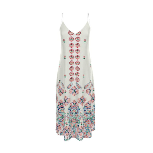 The Hello, World! dress is a white maxi with thin straps, featuring a vibrant floral and geometric pattern. It blends pink and blue hues in vertical lines on its charming fabric, enhanced by ornate motifs at the flared bottom for a bohemian style.