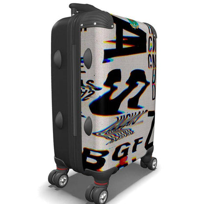 ChromaticSuitcase designer suitcase with bold, glitch-style typography print on hard shell. Stylish and durable for modern travel needs.