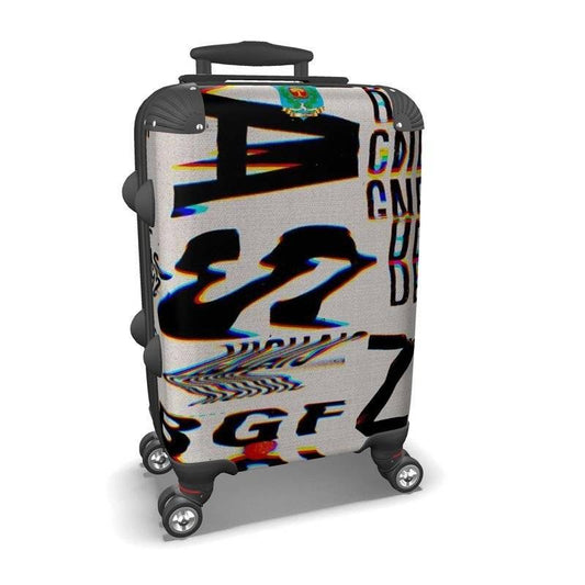 ChromaticSuitcase designer suitcase with bold, glitch-style typography print on hard shell. Stylish and durable for modern travel needs.