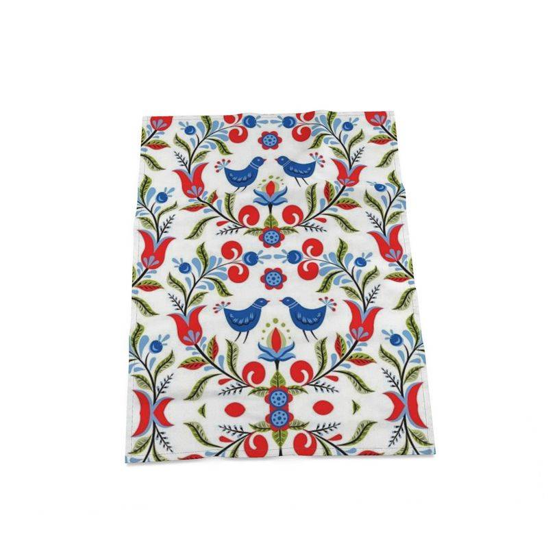 Lullaby - Premium oversized kitchen tea towel handmade to order featuring a vibrant folk art bird and floral pattern in red, blue, and green tones. A stylish and functional kitchen essential.