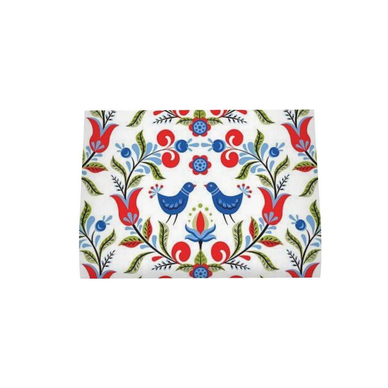 Lullaby - Premium oversized kitchen tea towel handmade to order featuring a vibrant folk art design with blue birds, red flowers, and green leaves.